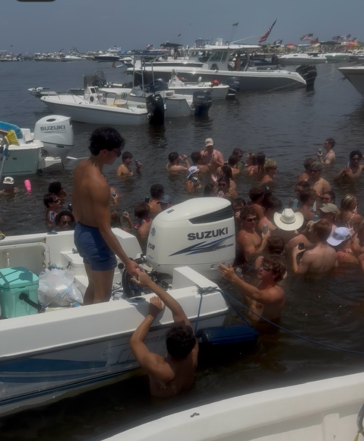 High-resolution Taylor and Cox exhibit still showing the crowded nearshore Horn Island boat gathering